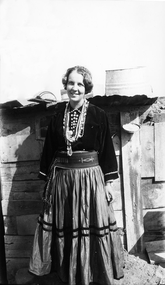 1)	Florence M. Hawley wearing the clothes of Mary, the wife of Nachipani, a Navajo worker in Chaco Canyon, 1929. CCNHP Neg. 28704