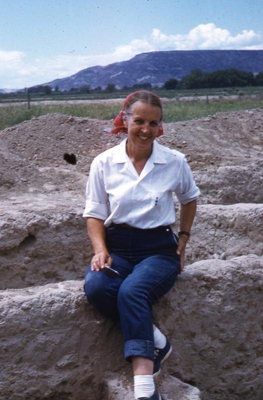 Florence Hawley Ellis sitting on the walls of Sapawe - August 1959