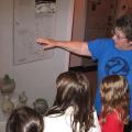 Docent Carolyn Minette with children