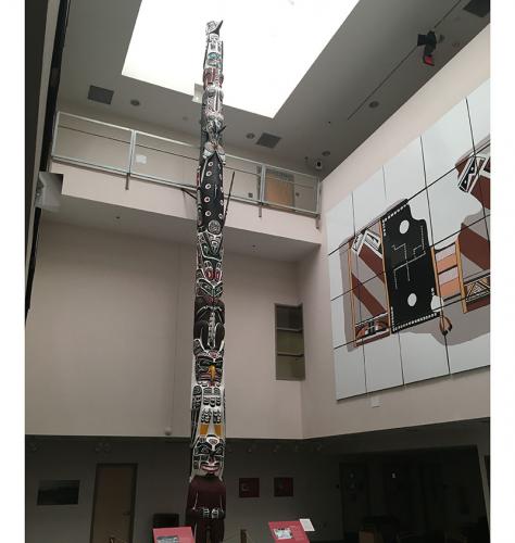 Smith Family Totem Pole stands in the Hibben Center Smith Family Totem Pole in the Hibben Center