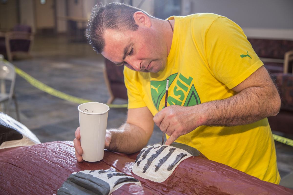 Carver Bertram Smith restores the Smith Family Totem Pole