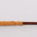 Spindle and whorl with spun wool attached. Holzapfel Collection MMA 2012.178.14